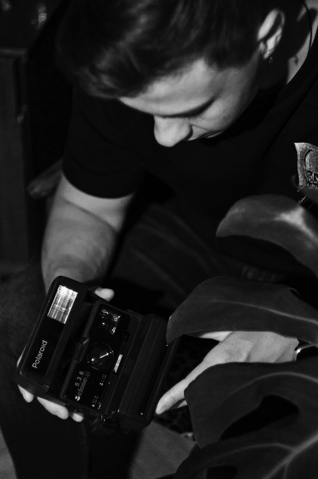 Broadcast technician switching between camera feeds on a vision mixer