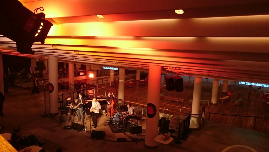News studio set with cameras and lighting rig