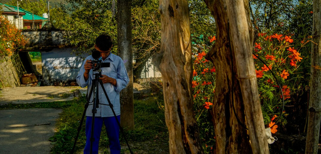 Broadcast gallery with director calling camera shots